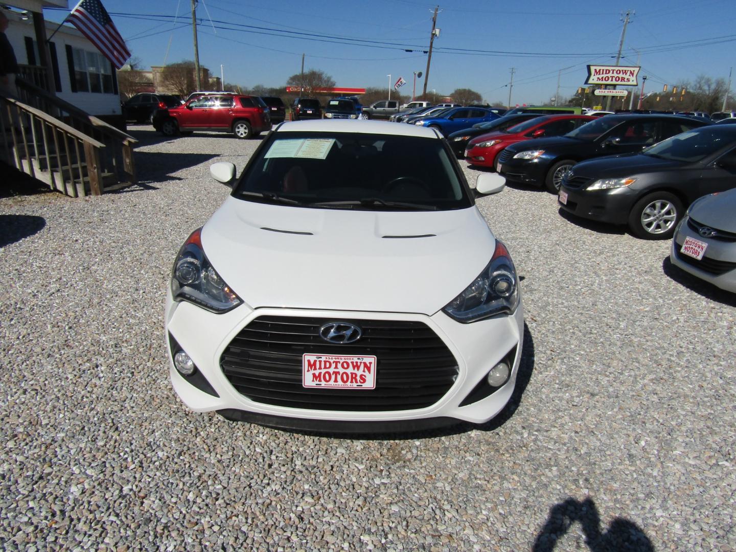 2014 White /Red Hyundai Veloster (KMHTC6AE3EU) with an 4 CYL engine, 6-Speed Manual transmission, located at 15016 S Hwy 231, Midland City, AL, 36350, (334) 983-3001, 31.306210, -85.495277 - Photo#1